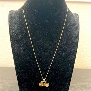 18karat gold box chain with bicycle pendant